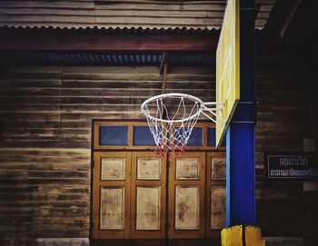 Low angle view of basketball hoop against building