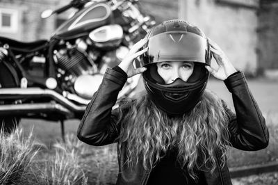 Portrait of girl wearing mask on field