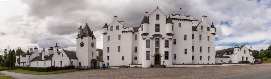 Panoramic view of buildings in city against sky