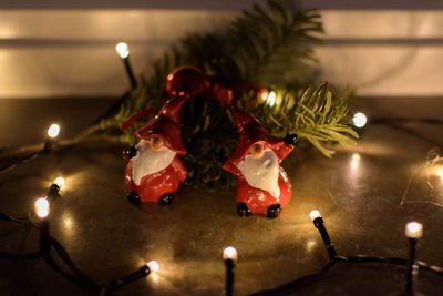 Close-up of christmas decoration with illuminated lighting equipment on table