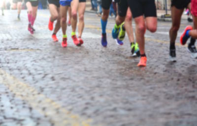 Low section of people running outdoors