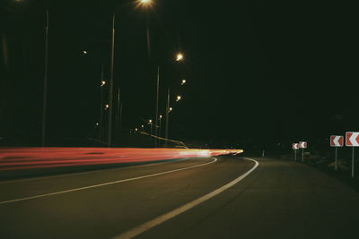 Light trails on road at night
