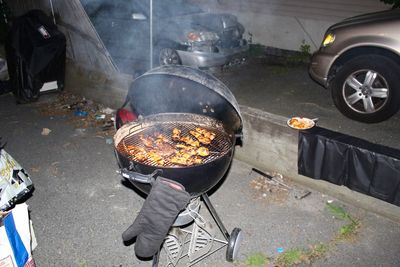 High angle view of meat on barbecue grill