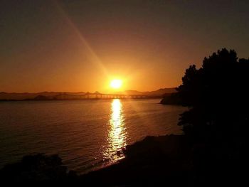 Scenic view of sunset over sea