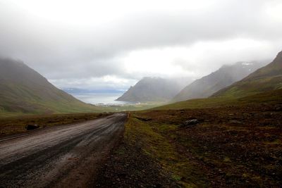 Road leading towards mountains