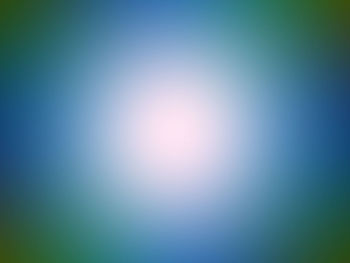 Defocused image of illuminated blue sky
