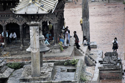 High angle view of people at old temple