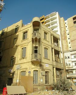 Low angle view of building against blue sky