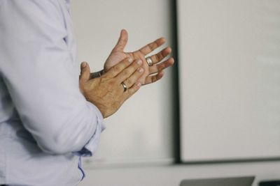 Close-up of woman hand with text