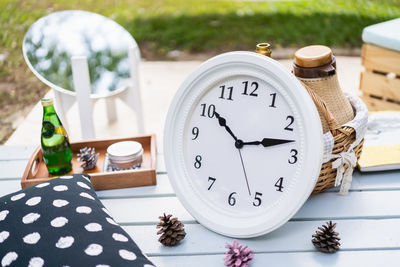 Close-up of clock on table