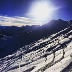 Scenic view of snowcapped mountain against sky