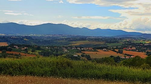 Scenic view of village against sky