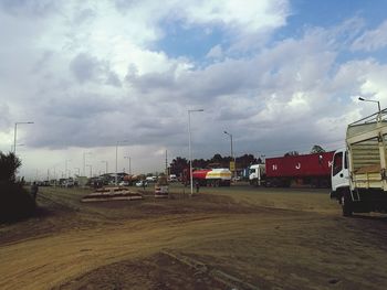 City street against cloudy sky