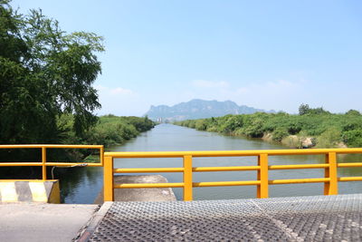 Scenic view of table by mountains against sky