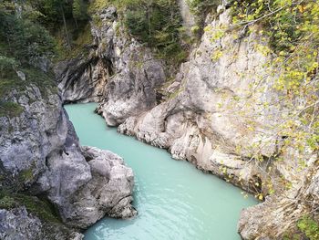 High angle view of river amidst rock formations