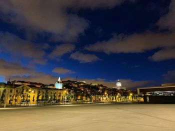 Illuminated buildings in city at night