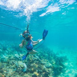 Man swimming in sea