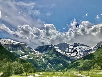 Scenic view of snowcapped mountains against sky