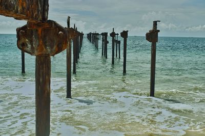 Iron posts in to the beach 