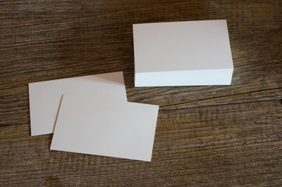 High angle view of white paper on table