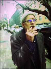 Man smoking while sitting in car