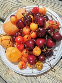 High angle view of fruits in plate on table