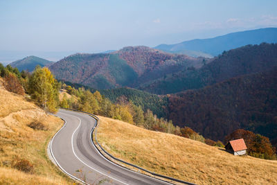 Road amidst trees against sky during autumn,  paltinis area, sibiu county, romania