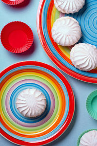 Directly above shot of multi colored candies in plate