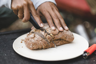 Close-up of person preparing food