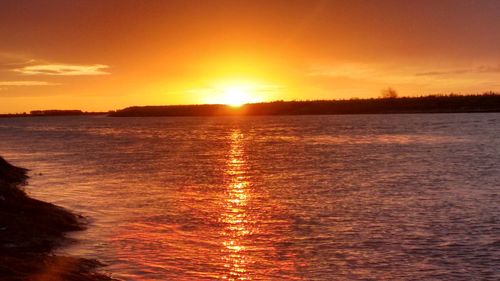 Scenic view of sunset over sea