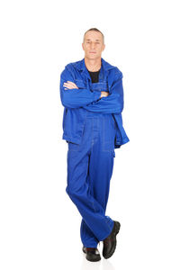 Portrait of man standing against white background