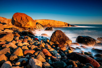 Scenic view of sea against clear sky