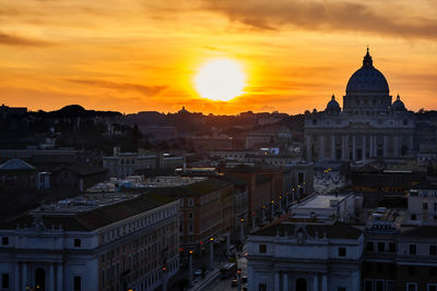 Cityscape against sky during sunset