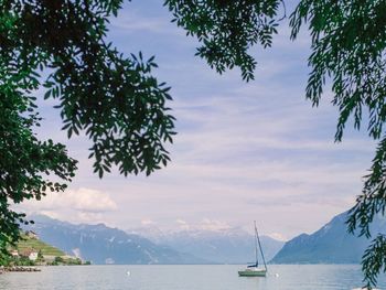 Scenic view of sea against cloudy sky