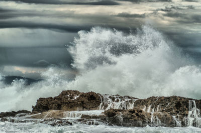 Scenic view of waves breaking