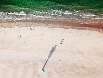 High angle view of umbrella on beach