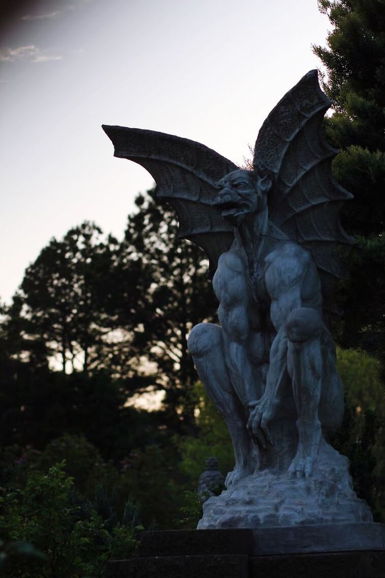 STATUE OF ANGEL AGAINST CLEAR SKY