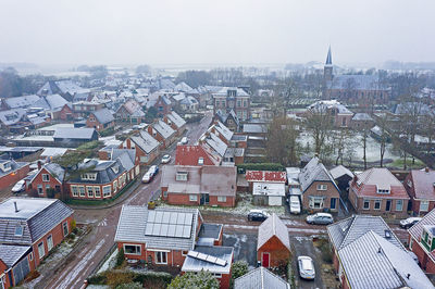 Aer8al from the snowy little village ternaard in the netherlands in winter