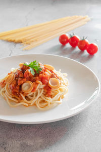 High angle view of pasta in plate on table