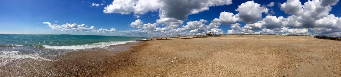 Panoramic view of beach against sky