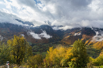 Scenic view of tree mountains against sky during autumn