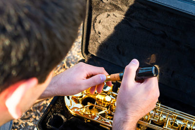 Close-up of man using mobile phone