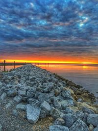 Scenic view of sea against dramatic sky