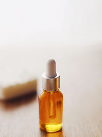 Close-up of bottles against white background