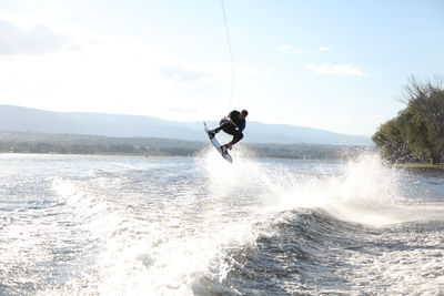 Man wakeboarding, extreme jump - córdoba, argentina.