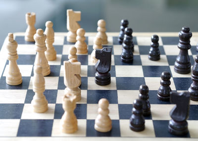 Close-up of chess pieces on board