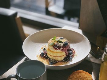 Close-up of cake served on table