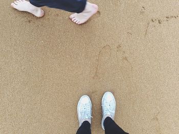 Low section of person standing on ground