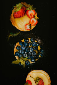 High angle view of breakfast on black background