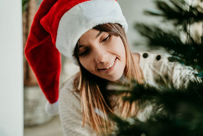 Portrait of smiling young woman in winter